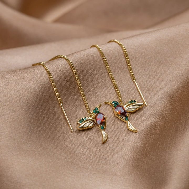 Anelli in oro con un delicato pendente